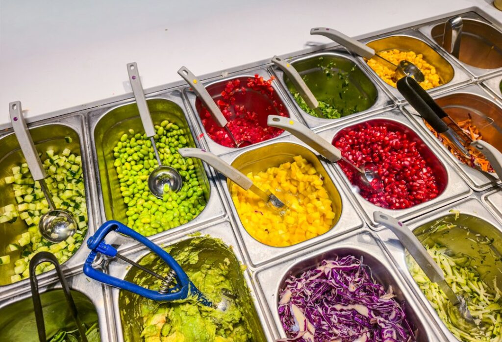 Cover photo illustrating healthy meal prep for beginners with stacked glass containers of grains, vegetables, and proteins on a kitchen counter